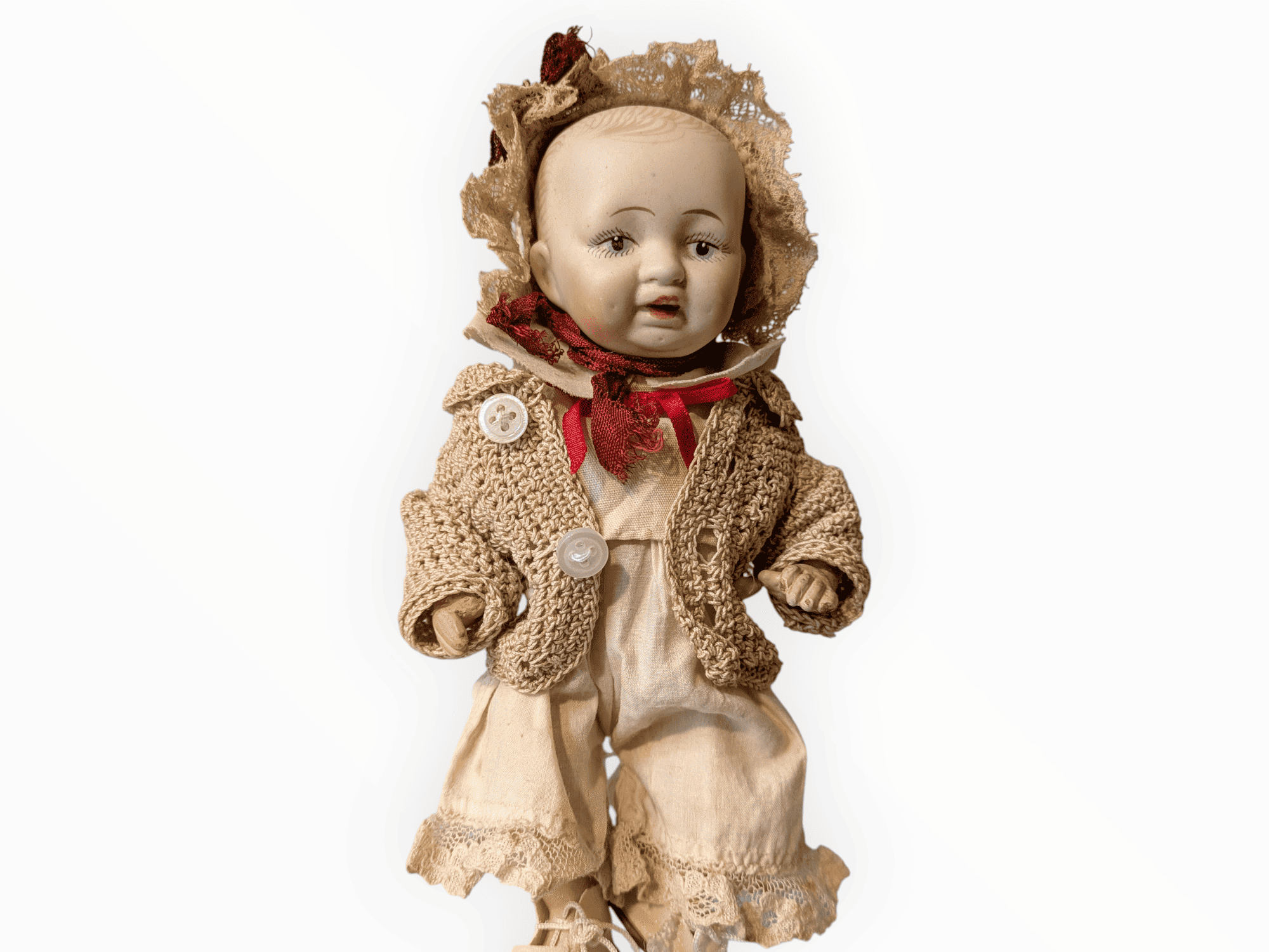 Muñeca antigua Morimura Bros con cabeza de bizcocho, chaqueta de ganchillo y capota